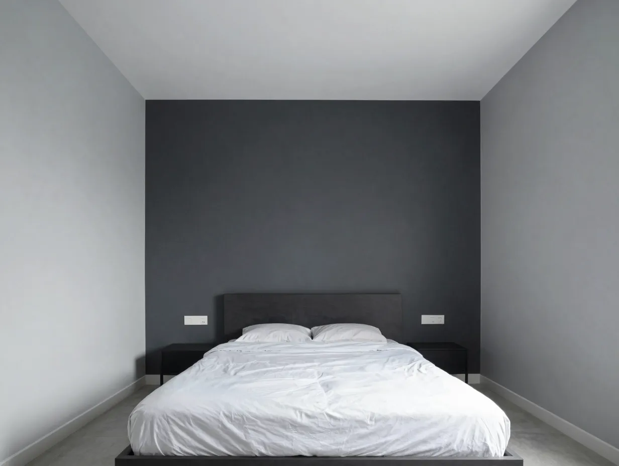 Pair light grey walls with a deep charcoal accent wall