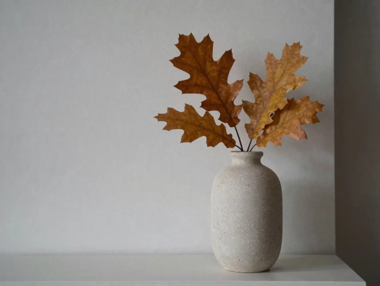 Oak leaves in stone vase