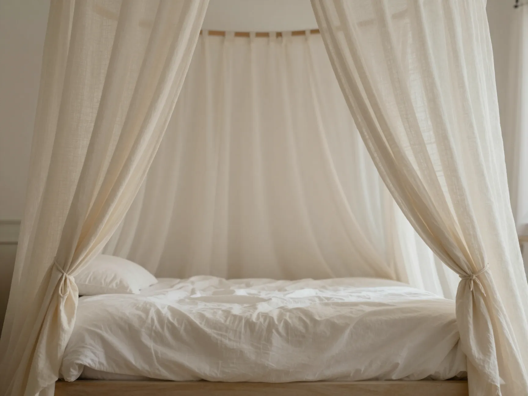 Add a canopy or draped fabric for instant romance