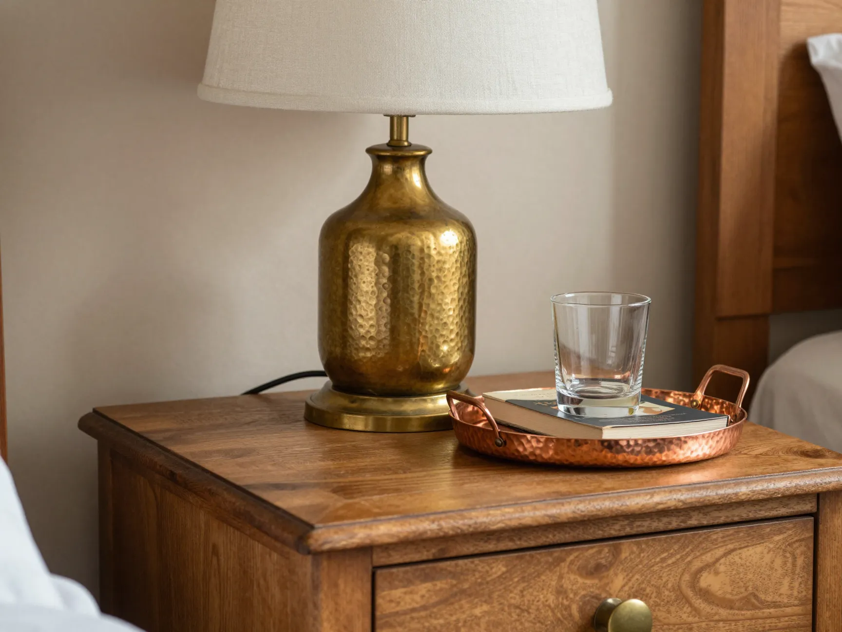 Use brass and copper accents as metallic anchors