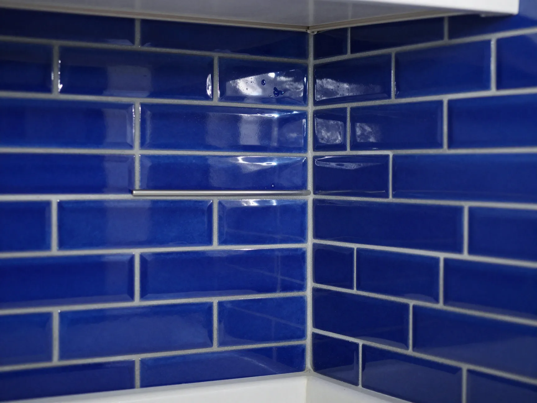 Glossy jewel tone tiles for drama and depth
