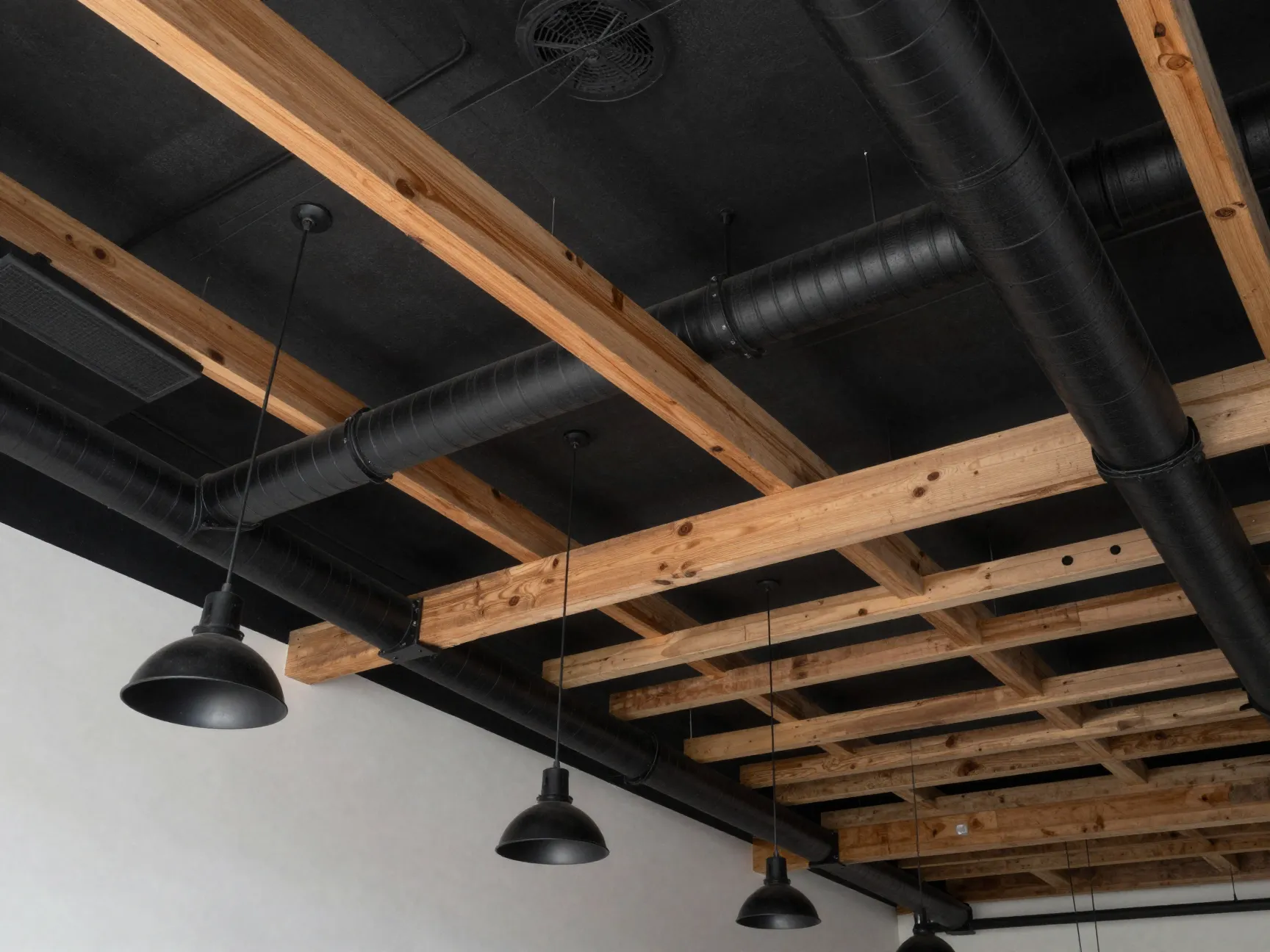 Open ceilings with exposed beams ducts and pipes