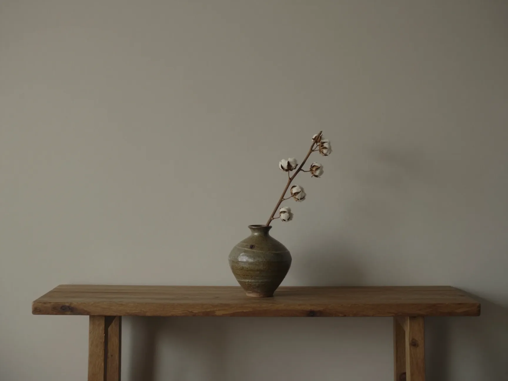 Embrace wabi sabi with a single imperfect vase and a dried branch