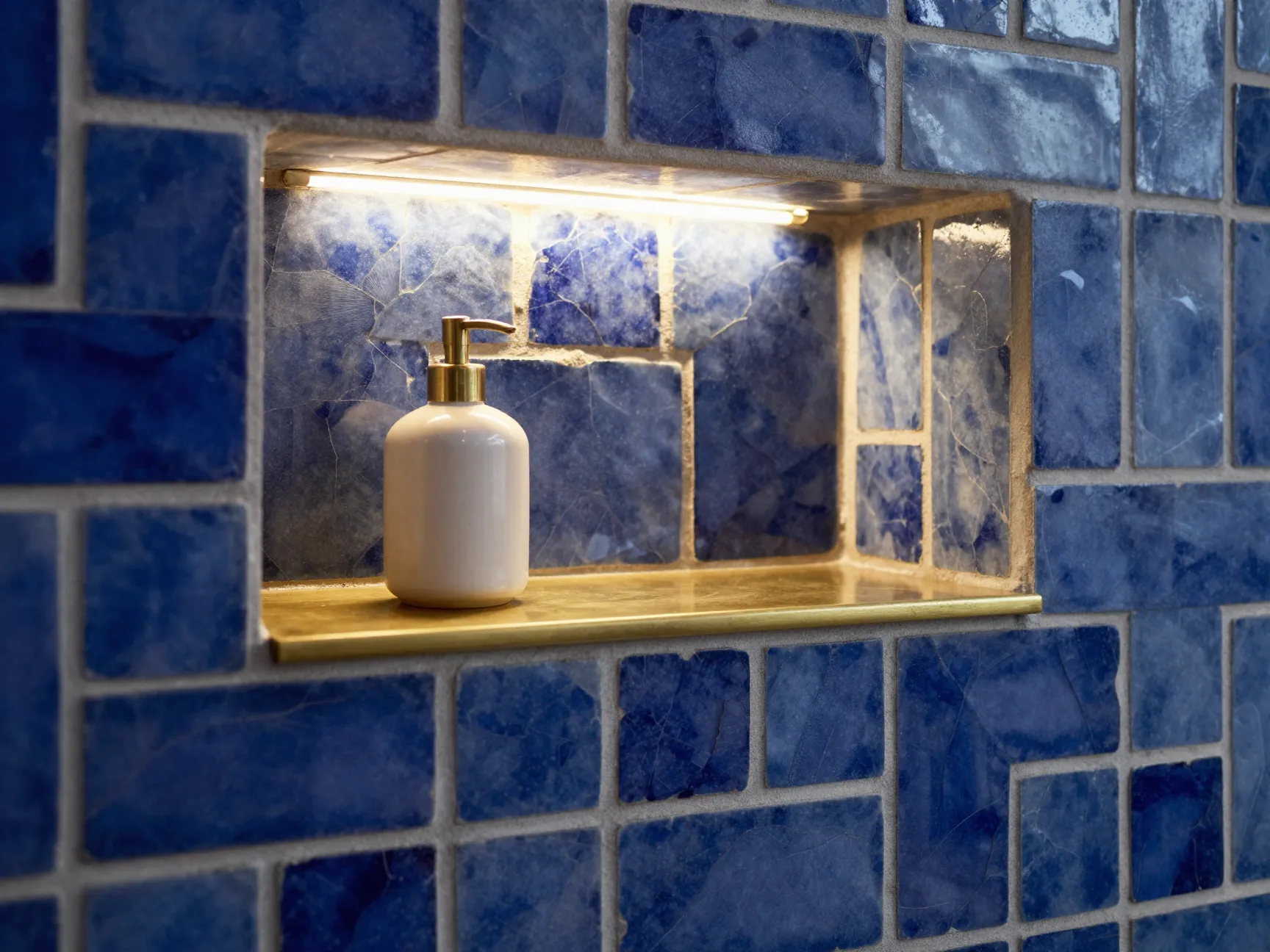 Create a statement niche with bold materials and led accents
